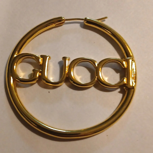 AUTHENTIC GUCCI GOLD TONE LOOP GUCCI NAME IN THE CENTER - Picture 3 of 5